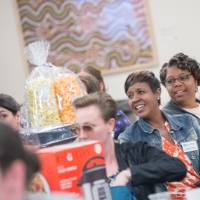 PSS smiling at tables